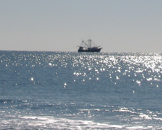 Shrimp boat on the ocean at Oak Island NC